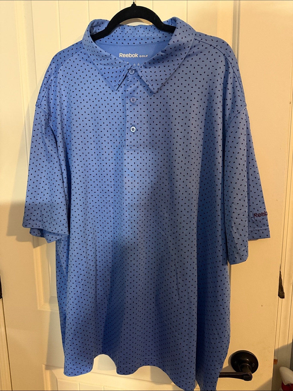 Reebok Men’s Blue Polo with Micro Dot Print